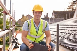 roofer on a roof in Dublin repairing a roof